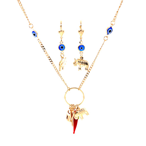The Mega Lucky Charm Pendant Necklace and Earrings set, crafted with 14K gold-filled materials, showcases captivating blue eye motifs and whimsical elephant charms for protection and luck. The pendant features a striking red horn accentuated by multiple gold designs, while the earrings elegantly mirror the enchanting elephant and eye motifs.